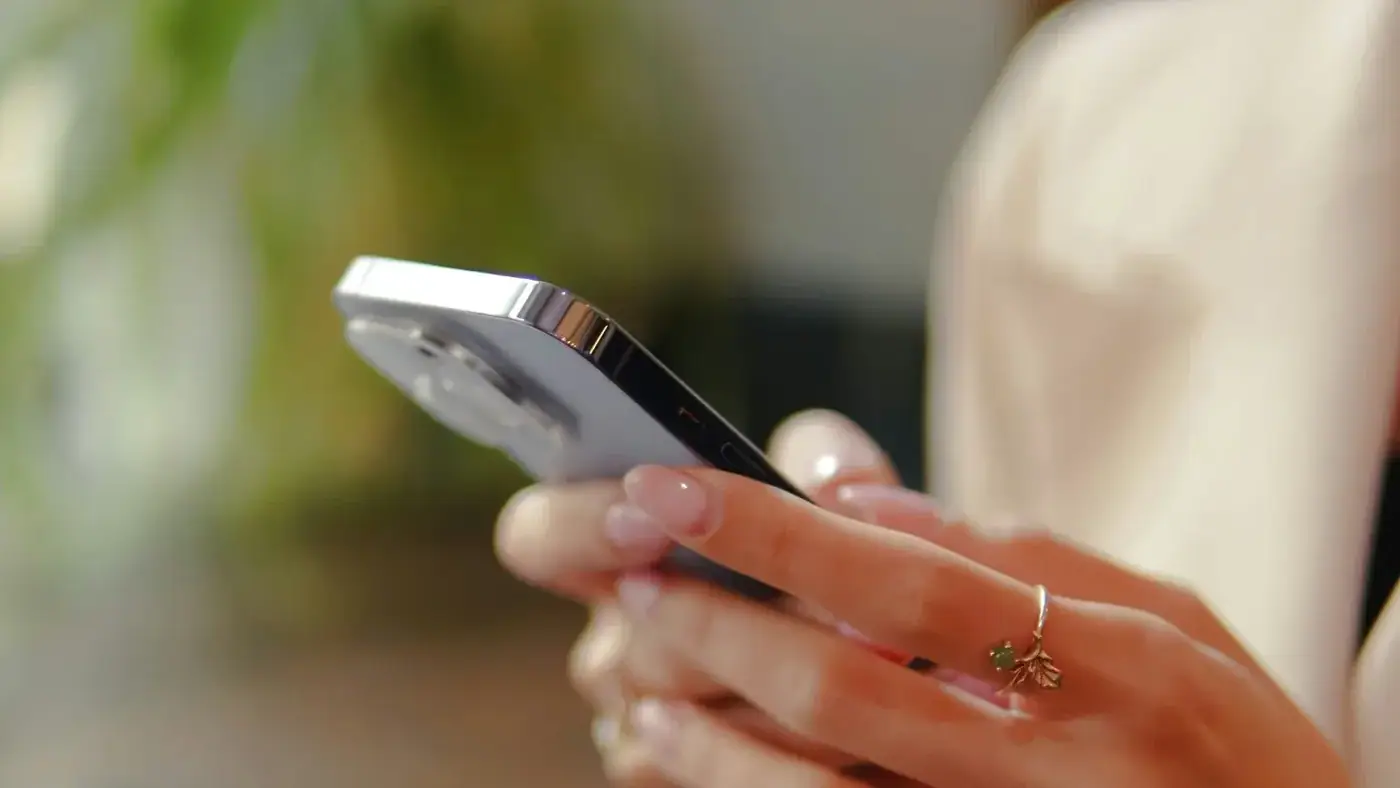 Hands using a phone