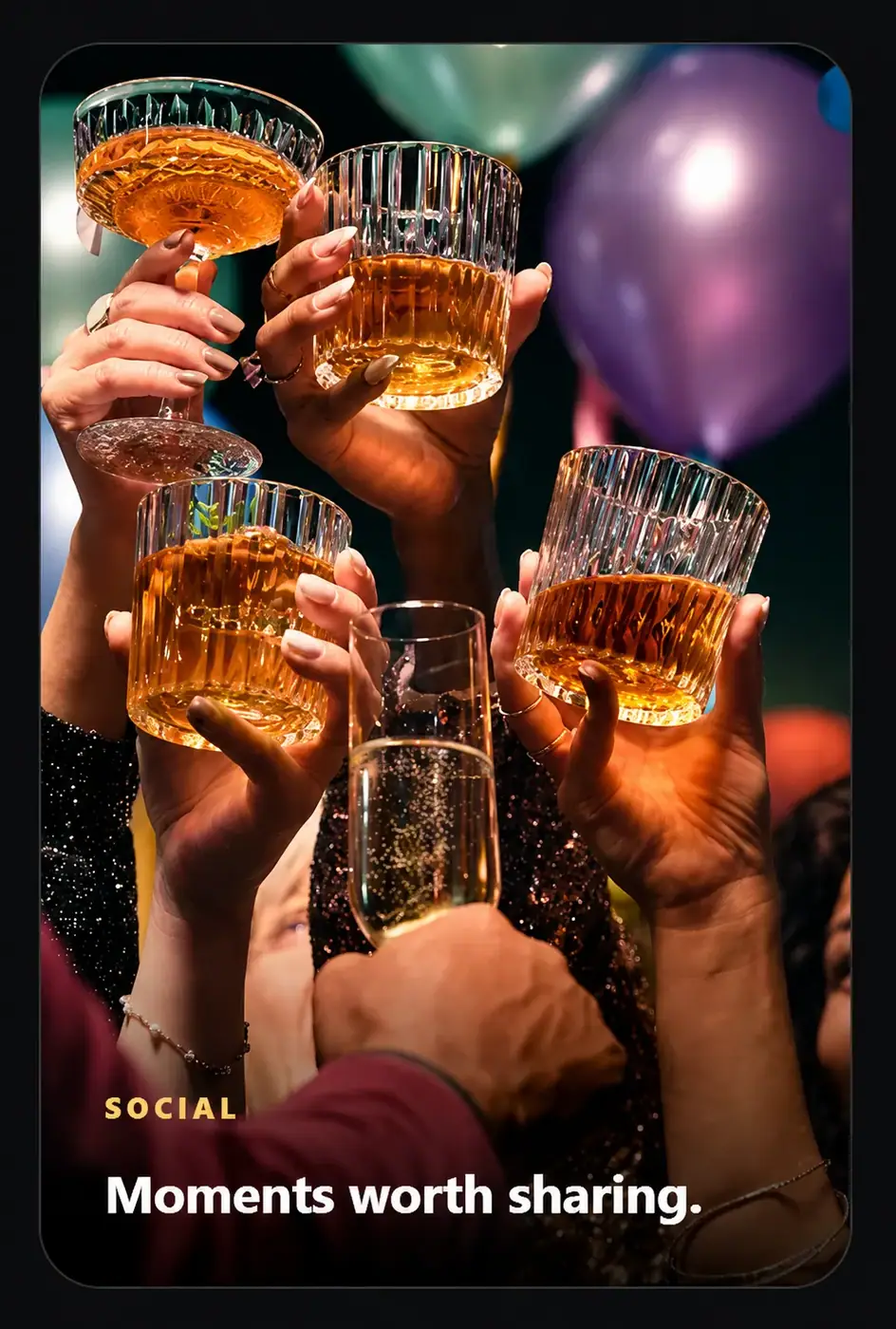 Hands raising glasses in a shared celebration