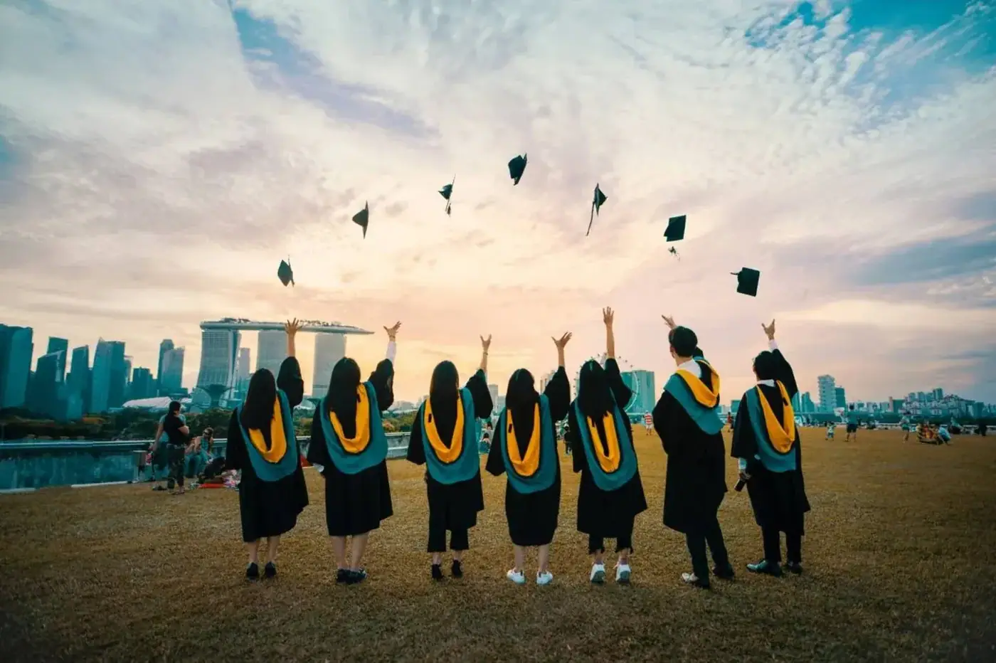Graduates from behind